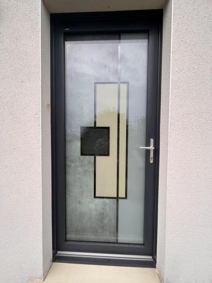 Porte d'entrée PVC / ALU vitrée