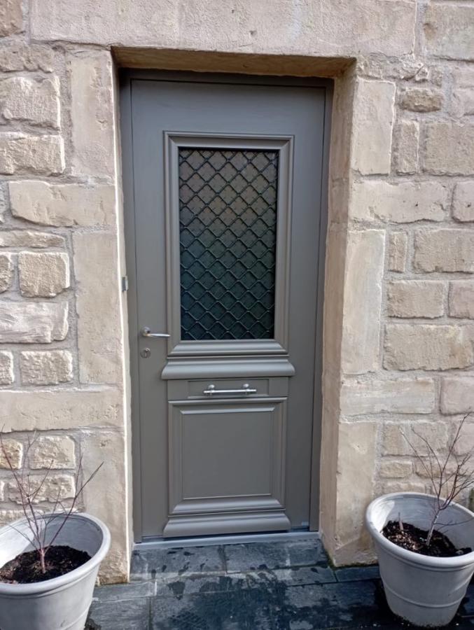 Porte d'entrée en aluminium