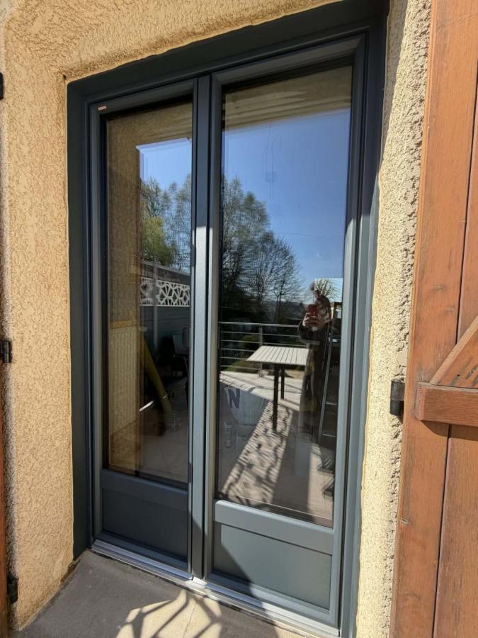 Porte fenêtre en PVC / ALU 